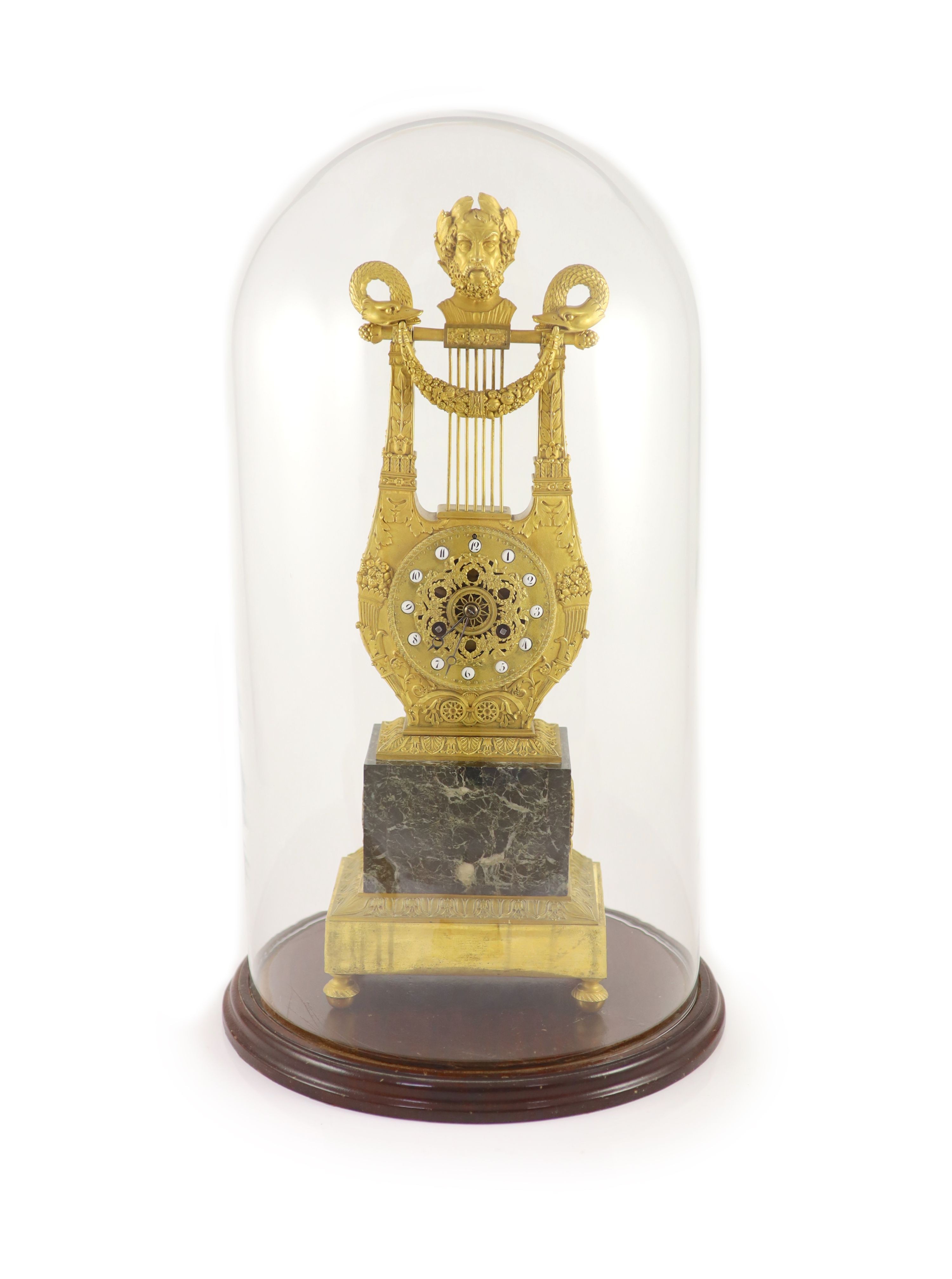 A 19th-century French ormolu and marble lyre shaped mantel clock H 52cm. W 18cm. D 12cm.